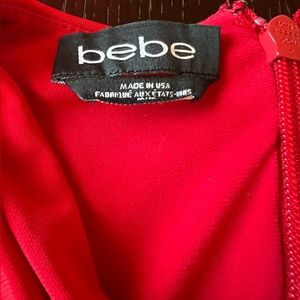 BEBE red dress fully lined with pockets